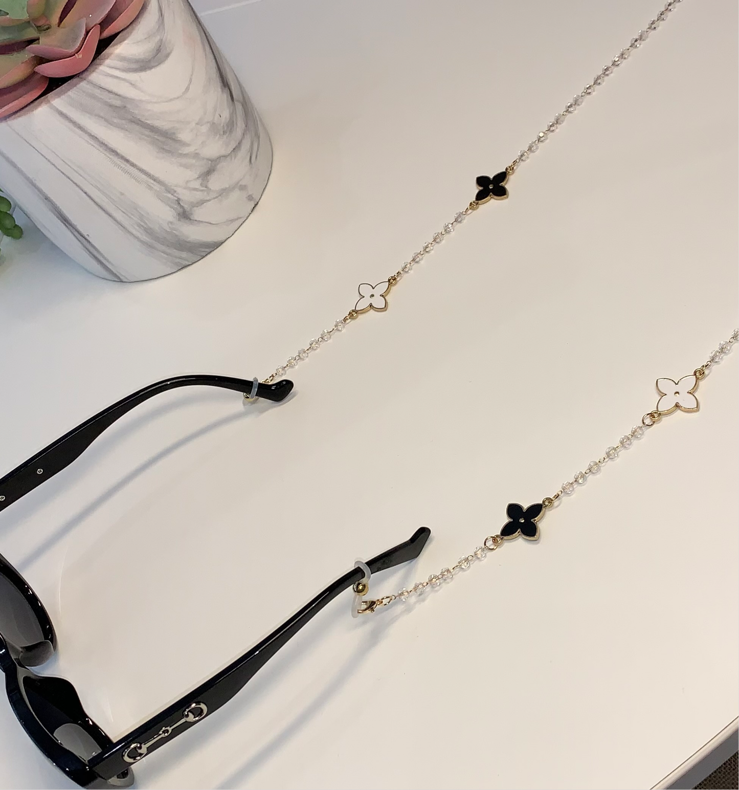 Gold clover sunglasses charm