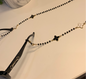 Black clover sunglasses charm